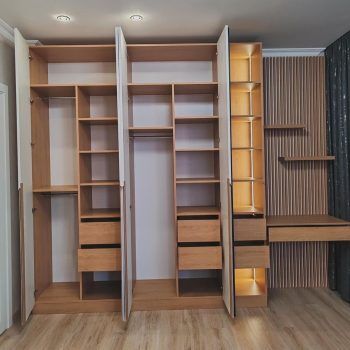 Closet en melamina con cajones e iluminación
